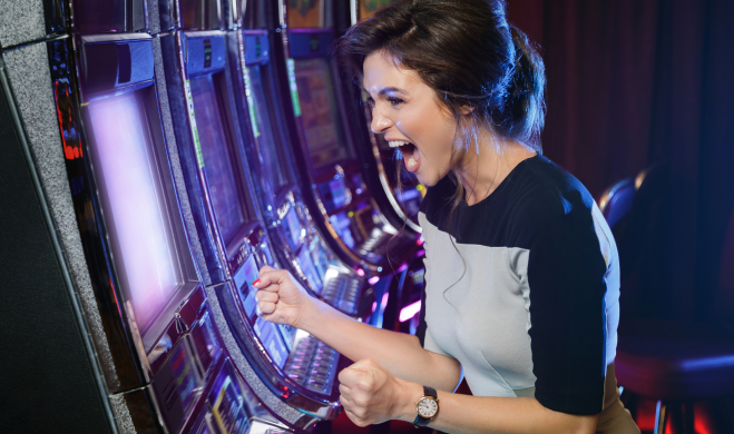 woman winning on slots