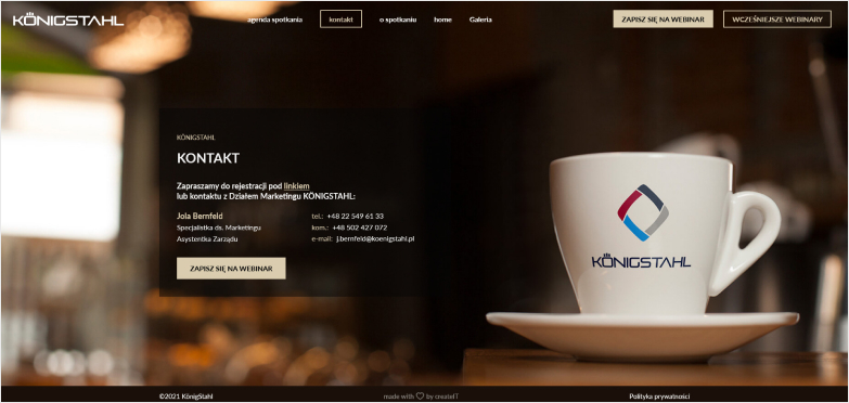 website with a cup in the background and company contact information